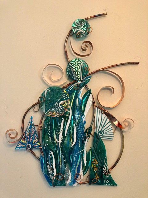 Teal Wheels: teal and green iridescent fused glass with white leaf patterns, framed by curling copper wheels.