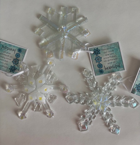 Snowflake Ornament: three iridescent fused-glass snowflakes.